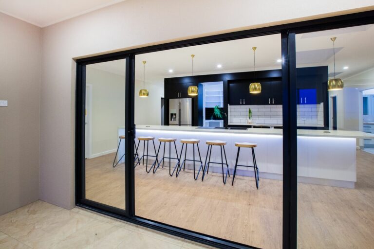 Nu-View Aluminium Windows, Doors & Glass - Paul Canty's Black & Gold on Granite Way Job